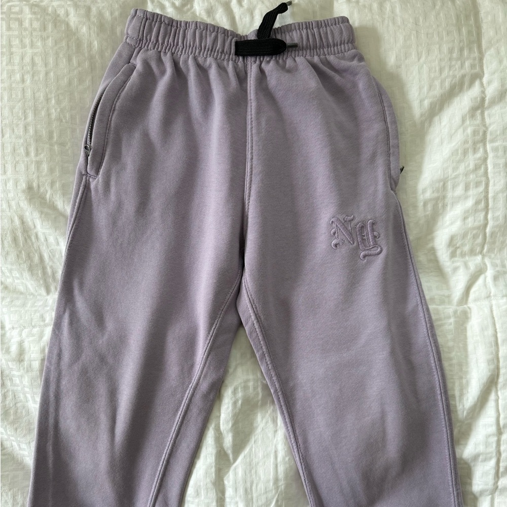 ZARA joggers with NY embroidery. Zip pockets